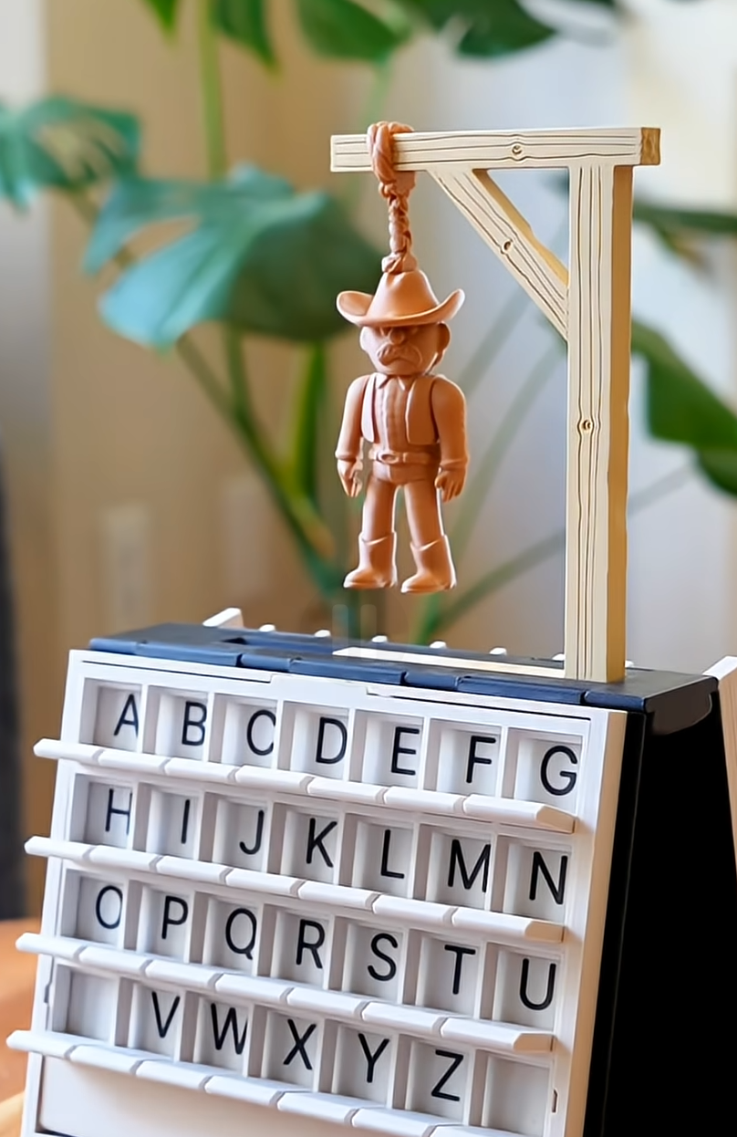 Close-up of a hardcover BoardBooks game cover and components